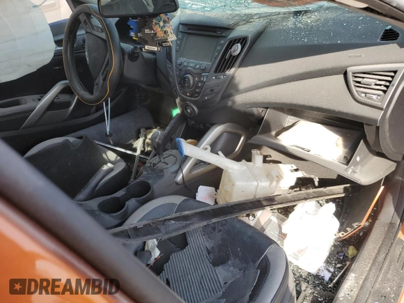 2015 Hyundai Veloster Turbo z VIN KMHTC6AE4FU232597, wystawiony jako Copart lot #74137024 z przebiegiem Nie podano mil oraz Szkoda całkowita • Salvage title. Historia ofert i sprzedaży dostępna na DreamBid. Obrazek 8.