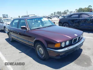 1993 BMW 7 Series with VIN WBAGD8327PDE87456, listed as a IAAI auction lot 42720246 with 143,502 mi miles and . Bid and sale history available at DreamBid. Image 1.