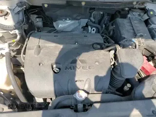 2018 Mitsubishi Outlander SE z VIN JA4AP3AW1JU014675, wystawiony jako Copart lot #71931535 z przebiegiem 114 578 mil mil oraz Szkoda całkowita • Salvage title. Historia ofert i sprzedaży dostępna na DreamBid. Obrazek 14.