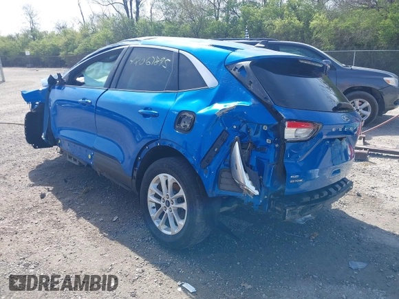 2020 Ford Escape SE with VIN 1FMCU9G63LUB63489, listed as a IAAI auction lot 42067895 with 68,496 mi miles. Bid and sale history available at carsss.com. Image 3.