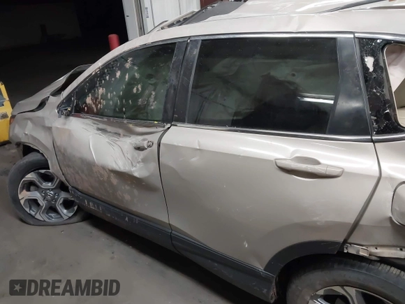 2018 Honda CR-V EX-L z VIN 2HKRW2H89JH671327, wystawiony jako IAAI lot #42159441 z przebiegiem Nie podano mil oraz . Historia ofert i sprzedaży dostępna na DreamBid. Obrazek 13.