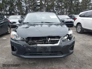 2012 Subaru Impreza Sedan 2.0i Premium with VIN JF1GJAC6XCH013674, listed as a IAAI auction lot 41081921 with 104,703 mi miles. Bid and sale history available at carsss.com. Image 12.