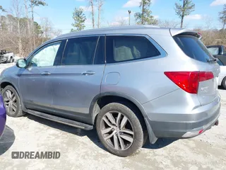 2017 Honda Pilot Touring with VIN 5FNYF6H94HB006873, listed as a IAAI auction lot 41618529 with 154,689 mi miles. Bid and sale history available at carsss.com. Image 14.