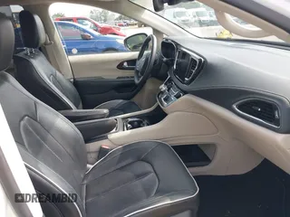 2023 Chrysler Pacifica Limited with VIN 2C4RC1GG7PR566163, listed as a IAAI auction lot 42393988 with 59,354 mi miles and . Bid and sale history available at DreamBid. Image 5.