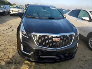 2022 Cadillac XT5 FWD Luxury z VIN 1GYKNAR49NZ159814, wystawiony jako Copart lot #74506584 z przebiegiem 7 069 mil mil oraz Nie do naprawy • Non repairable. Historia ofert i sprzedaży dostępna na DreamBid. Obrazek 5.