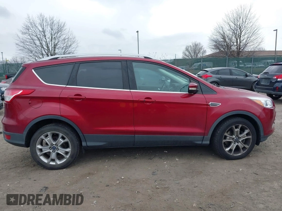 2016 Ford Escape Titanium with VIN 1FMCU9J92GUB13000, listed as a IAAI auction lot 41725258 with 66,817 mi miles. Bid and sale history available at carsss.com. Image 12.