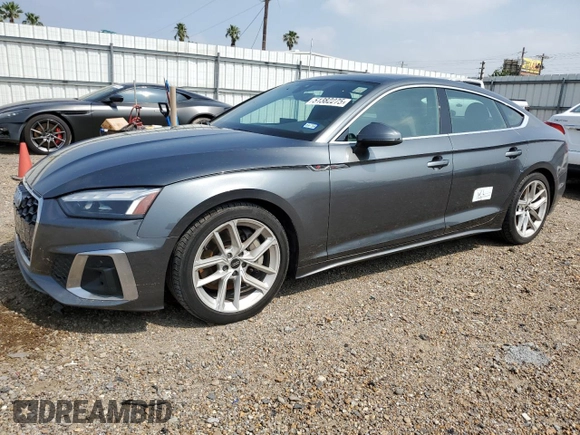 2023 Audi A5 Sportback S line Premium z VIN WAUDACF54PA015797, wystawiony jako Copart lot #51382275 z przebiegiem 31 836 mil mil oraz Szkoda całkowita • Salvage title. Historia ofert i sprzedaży dostępna na DreamBid. Obrazek 1.