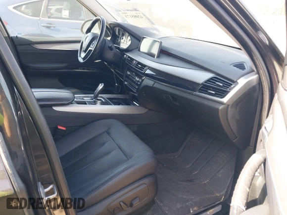 2014 BMW X5 xDrive35d with VIN 5UXKS4C57E0J93982, listed as a IAAI auction lot 42085173 with 169,908 mi miles. Bid and sale history available at carsss.com. Image 5.