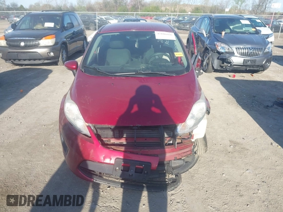 2013 Ford Fiesta SE with VIN 3FADP4EJ0DM171765, listed as a IAAI auction lot 42106666 with 149,873 mi miles and . Bid and sale history available at DreamBid. Image 13.