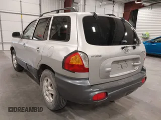 2004 Hyundai Santa Fe GLS with VIN KM8SC73D44U757341, listed as a IAAI auction lot 42254675 with 237,770 mi miles and . Bid and sale history available at DreamBid. Image 3.
