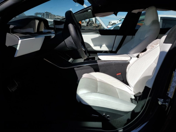 2023 Tesla Model S Plaid with VIN 5YJSA1E64PF499373, listed as a Copart auction lot 78744674 with Not provided miles and Salvage title. Bid and sale history available at DreamBid. Image 7.