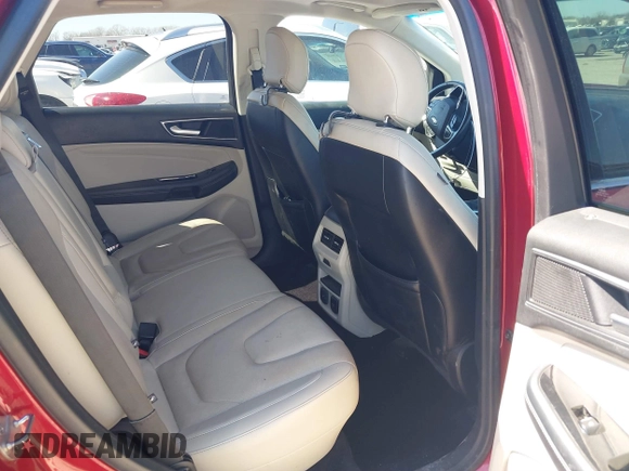 2015 Ford Edge Titanium z VIN 2FMPK3K83FBB06068, wystawiony jako IAAI lot #41774040 z przebiegiem 134 821 mil mil oraz . Historia ofert i sprzedaży dostępna na DreamBid. Obrazek 8.