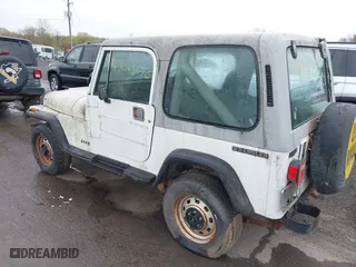 1990 Jeep Wrangler with VIN 2J4FY29T6LJ523487, listed as a IAAI auction lot 42008870 with 88,619 mi miles. Bid and sale history available at carsss.com. Image 3.