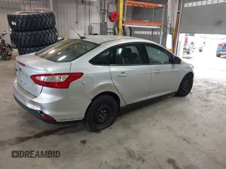 2012 Ford Focus SE with VIN 1FAHP3F26CL207199, listed as a IAAI auction lot 42149458 with 242,158 mi miles. Bid and sale history available at carsss.com. Image 4.