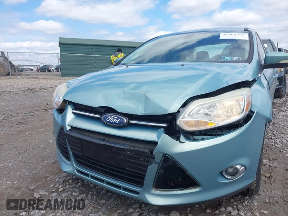 2012 Ford Focus SEL with VIN 1FAHP3H29CL248780, listed as a IAAI auction lot 41961348 with 120,719 mi miles. Bid and sale history available at carsss.com. Image 6.