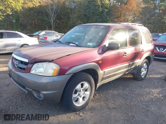 2003 Mazda Tribute ES with VIN 4F2CZ96183KM35719, listed as a IAAI auction lot 40611399 with 136,374 mi miles. Bid and sale history available at carsss.com. Image 6.