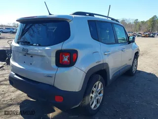 2015 Jeep Renegade Latitude with VIN ZACCJBBTXFPC40947, listed as a IAAI auction lot 41910717 with 135,537 mi miles. Bid and sale history available at carsss.com. Image 4.