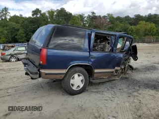 1998 GMC Yukon with VIN 1GKEK13R8WJ722890, listed as a Copart auction lot 72904114 with 243,711 mi miles and Salvage Title. Bid and sale history available at carsss.com. Image 3.