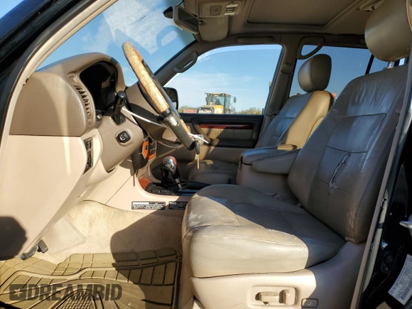 2000 Lexus LX 470 z VIN JT6HT00W3Y0090164, wystawiony jako Copart lot #41338515 z przebiegiem 209 338 mil mil oraz Szkoda całkowita • Salvage title. Historia ofert i sprzedaży dostępna na DreamBid. Obrazek 7.