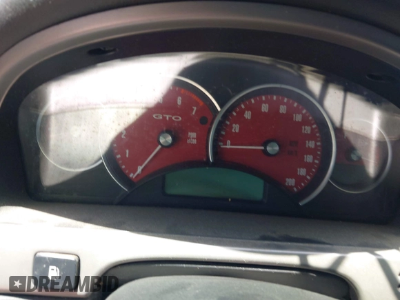 2004 Pontiac GTO z VIN 6G2VX12G04L295369, wystawiony jako IAAI lot #42244826 z przebiegiem Nie podano mil oraz . Historia ofert i sprzedaży dostępna na DreamBid. Obrazek 14.