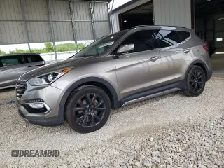 2017 Hyundai Santa Fe Ultimate z VIN 5XYZW4LA4HG396277, wystawiony jako Copart lot #57651915 z przebiegiem Nie podano mil oraz Szkoda całkowita • Salvage title. Historia ofert i sprzedaży dostępna na DreamBid. Obrazek 1.