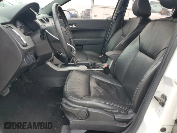 2011 Ford Focus SEL with VIN 1FAHP3HN5BW200734, listed as a Copart auction lot 51897025 with 156,219 mi miles and Salvage Title. Bid and sale history available at DreamBid. Image 7.