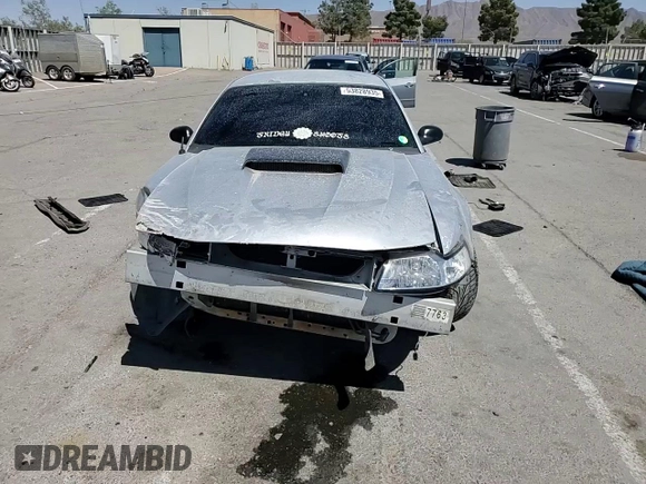 2001 Ford Mustang GT Deluxe z VIN 1FAFP42X61F165305, wystawiony jako Copart lot #53828935 z przebiegiem 175 538 mil mil oraz Szkoda całkowita • Salvage title. Historia ofert i sprzedaży dostępna na DreamBid. Obrazek 13.