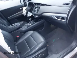 2022 Cadillac XT4 FWD Premium Luxury with VIN 1GYFZCR45NF164754, listed as a IAAI auction lot 41278705 with 65,698 mi miles. Bid and sale history available at carsss.com. Image 5.