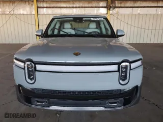 2022 Rivian R1T Adventure Package with VIN 7FCTGAAA3NN014291, listed as a Copart auction lot 76587044 with 0 mi miles and Salvage Title. Bid and sale history available at carsss.com. Image 5.
