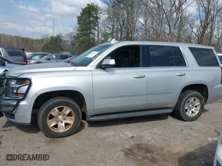2017 Chevrolet Tahoe Commercial with VIN 1GNLCDECXHR238788, listed as a IAAI auction lot 41718161 with 129,880 mi miles. Bid and sale history available at carsss.com. Image 14.