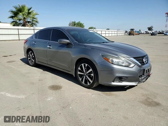 2016 Nissan Altima SR z VIN 1N4AL3AP5GC209029, wystawiony jako Copart lot #55973955 z przebiegiem 131 909 mil mil oraz Szkoda całkowita • Salvage title. Historia ofert i sprzedaży dostępna na DreamBid. Obrazek 13.