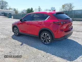 2022 Mazda CX-5 2.5 S Premium Package with VIN JM3KFBDM5N1532837, listed as a IAAI auction lot 41869721 with 59,249 mi miles. Bid and sale history available at carsss.com. Image 3.