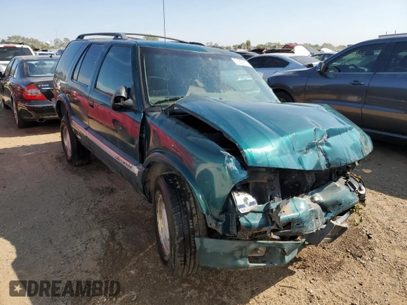 1996 GMC Jimmy SL with VIN 1GKCS13W0T2553905, listed as a Copart auction lot 71007674 with 169,513 mi miles and Salvage Title. Bid and sale history available at carsss.com. Image 4.
