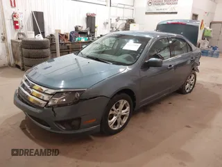 2012 Ford Fusion SE z VIN 3FAHP0HA9CR180004, wystawiony jako IAAI lot #42037384 z przebiegiem 111 262 mil mil oraz . Historia ofert i sprzedaży dostępna na DreamBid. Obrazek 17.