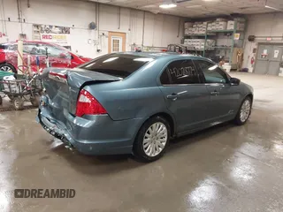 2012 Ford Fusion Hybrid z VIN 3FADP0L31CR443545, wystawiony jako IAAI lot #42028774 z przebiegiem 194 365 mil mil oraz . Historia ofert i sprzedaży dostępna na DreamBid. Obrazek 4.