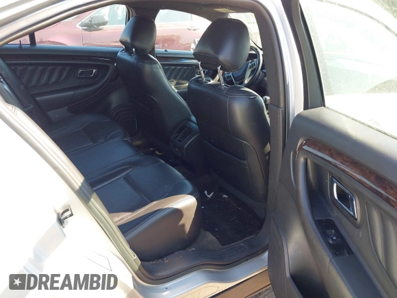 2013 Ford Taurus Limited with VIN 1FAHP2F83DG231176, listed as a IAAI auction lot 42776538 with 220,580 mi miles and . Bid and sale history available at DreamBid. Image 8.