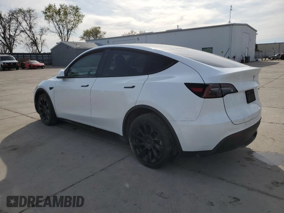2023 Tesla Model Y Long Range z VIN 7SAYGDEE2PA065048, wystawiony jako Copart lot #48403655 z przebiegiem 56 553 mil mil oraz Szkoda całkowita • Salvage title. Historia ofert i sprzedaży dostępna na DreamBid. Obrazek 2.