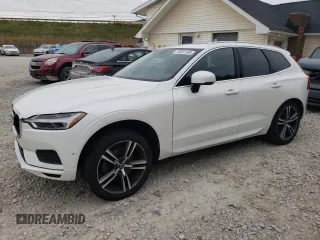 2019 Volvo XC60 Momentum z VIN LYVA22RK0KB219092, wystawiony jako Copart lot #76661164 z przebiegiem 64 104 mil mil oraz Szkoda całkowita • Salvage title. Historia ofert i sprzedaży dostępna na DreamBid. Obrazek 1.