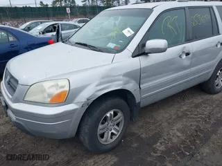 2003 Honda Pilot EX with VIN 2HKYF18513H600959, listed as a IAAI auction lot 41600484 with 999,999 mi miles. Bid and sale history available at carsss.com. Image 6.