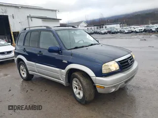 2003 Suzuki Grand Vitara z VIN JS3TD62V134105917, wystawiony jako IAAI lot #41415963 z przebiegiem 87 548 mil mil oraz . Historia ofert i sprzedaży dostępna na DreamBid. Obrazek 1.