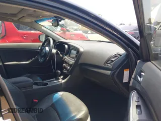 2015 Kia Optima EX z VIN KNAGN4AD9F5085003, wystawiony jako IAAI lot #42659448 z przebiegiem 128 334 mil mil oraz . Historia ofert i sprzedaży dostępna na DreamBid. Obrazek 5.
