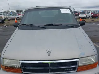 1993 Dodge Caravan Grand SE z VIN 1B4GH44R7PX729957, wystawiony jako IAAI lot #41932278 z przebiegiem 176 577 mil mil oraz . Historia ofert i sprzedaży dostępna na DreamBid. Obrazek 6.