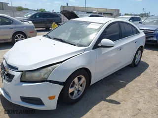 2014 Chevrolet Cruze 1LT with VIN 1G1PC5SB7E7166217, listed as a IAAI auction lot 41839197 with 133,436 mi miles. Bid and sale history available at carsss.com. Image 2.