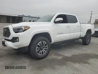 2023 Toyota Tacoma SR5 z VIN 3TMDZ5BN4PM149337, wystawiony jako Copart lot #55637135 z przebiegiem 26 868 mil mil oraz Szkoda całkowita • Salvage title. Historia ofert i sprzedaży dostępna na DreamBid. Obrazek 1.