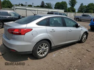 2017 Ford Focus SE with VIN 1FADP3F23HL304625, listed as a Copart auction lot 59760065 with 87,130 mi miles and Salvage title. Bid and sale history available at DreamBid. Image 3.