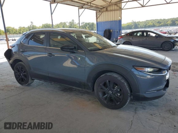2022 Mazda CX-30 2.5 Turbo with VIN 3MVDMBAY5NM412116, listed as a Copart auction lot 68375524 with 25,799 mi miles and Salvage Title. Bid and sale history available at DreamBid. Image 4.