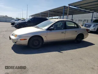 2000 Saturn SL with VIN 1G8ZK5274YZ103237, listed as a Copart auction lot 60558105 with 126,320 mi miles and Salvage title. Bid and sale history available at DreamBid. Image 1.