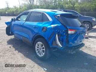 2020 Ford Escape SE with VIN 1FMCU9G63LUB63489, listed as a IAAI auction lot 42067895 with 68,496 mi miles. Bid and sale history available at carsss.com. Image 3.