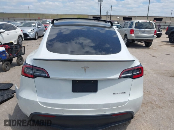 2021 Tesla Model Y Performance with VIN 5YJYGDEF9MF081798, listed as a IAAI auction lot 42033358 with 64,679 mi miles and . Bid and sale history available at DreamBid. Image 17.