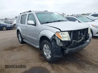 2005 Nissan Pathfinder SE with VIN 5N1AR18W25C756102, listed as a IAAI auction lot 42401583 with 175,796 mi miles and . Bid and sale history available at DreamBid. Image 1.